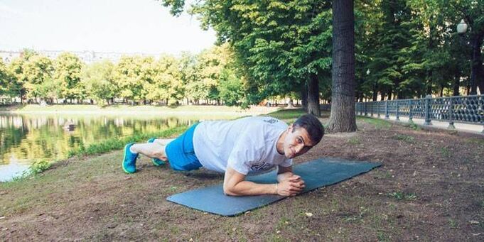 man doing plank to lose weight